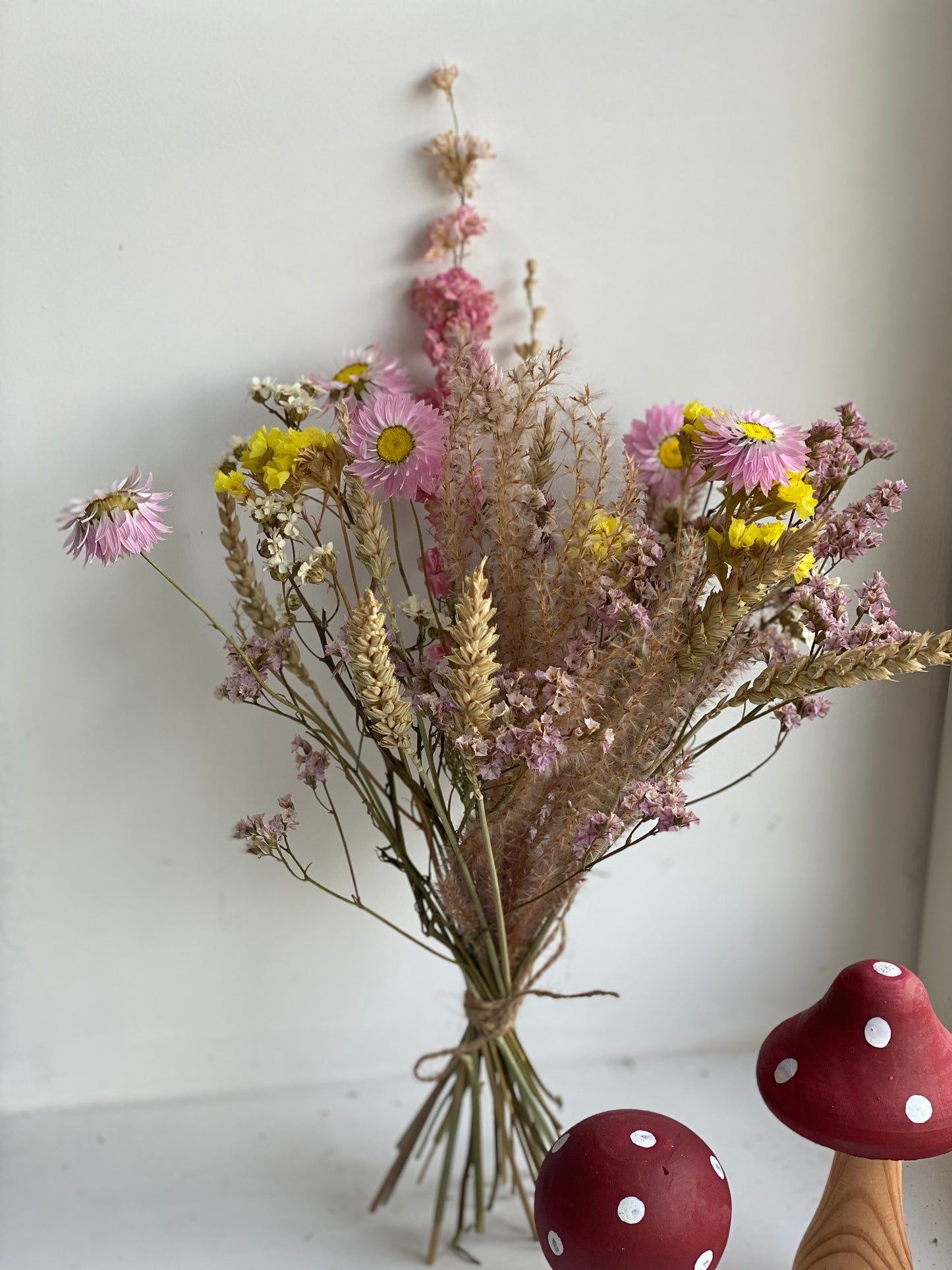 Small bouquet of dried flowers color mix